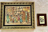 Both artwork pieces displayed on a neutral wall, showing size difference and framing styles