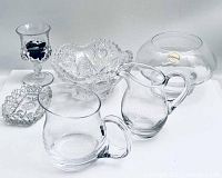 Full lot showing Lenox crystal bowl, cut glass bowl, salt cellar, creamer, aperitif glasses, and some polished stones.