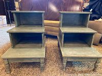 Front view of both end tables showing stepped three-tier design and spindle-turned legs