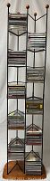 Full view of metal CD stand loaded with multiple classical music CDs
