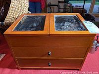 Wooden jewelry box with two glass panels on top and two drawers below
