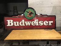 Full front view of Budweiser sign on table