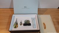 Alfred Sung Shi perfume and gel candle gift set in original white box showing all four items and box lid branding