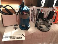 Ryobi TR-30U Handy Trimmer and Black & Decker Drill/Router Guide side by side with manuals visible.