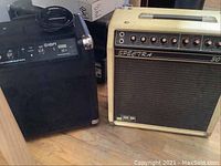 Ion Block Rocker Bluetooth speaker and JMF Spectra 30-7 amplifier side by side on floor showing overall condition and power cords.