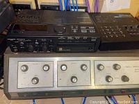 Three devices stacked showing Marantz on left, Roland on right, Sears unit below