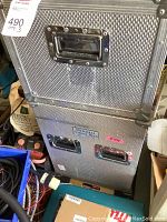 Two stacked silver aluminum flight cases with textured surface, one labeled ‘Mitchell Vitesse Head’