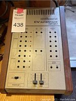 Top view showing full patch matrix, LED indicators, faders, and housing
