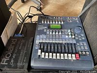 Roland DIF-AT interface box and Roland VM-3100 Pro mixing station inside a rack case