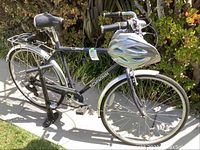 Full side view of Schwinn Admiral bicycle with helmet mounted on handlebars