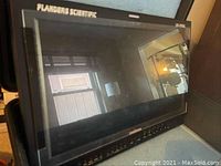 Front view of monitor in Pelican case showing screen and control panel