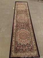 Full view of the Amarante runner rug showing overall pattern and colors