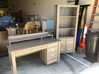 Full view of desk and bookcase set showing overall condition and matching finish.