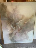 Frontal view of the large abstract mixed media painting showing cloud-like patterns in neutral and soft colors.