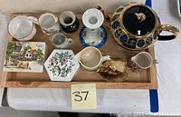 All porcelain items displayed on wooden tray (tray not included)