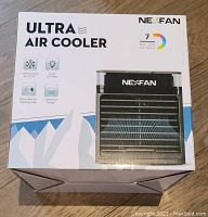 Box front of Nexfan Ultra Air Cooler showing product image and features