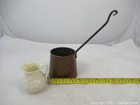 Full view of both items side by side with measuring tape showing dimensions