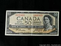 Obverse full view showing portrait of Queen Elizabeth II, red serial number and signatures