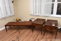 Overall view of coffee table and two end tables showing size and style