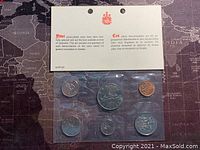 1976 Canadian proof-like coin set sealed in original packaging with government card backing, front view showing all six coins.