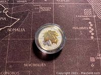 Reverse side of the 2014 Silver Maple Leaf 2 Dollars coin showing gold plated maple leaf and year