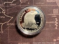 Obverse side of the 2015 Canadian silver coin showing a bald eagle design and silver content details.
