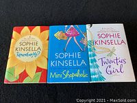 Front covers of the three Sophie Kinsella novels showing colorful front dust jackets.