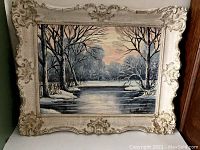 Full view of the framed painting showing winter landscape and overall frame condition.