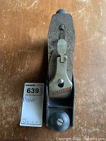 Top view of the Stanley Handyman wood plane showing the clamp lever with branding and front knob handle.