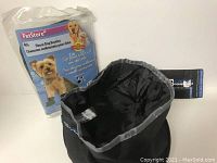 Photo showing the packaged fleece dog booties and the open portable water dish.