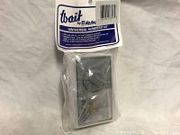 Front view of sealed packaging showing the branded label and the humidistat device inside.