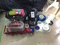 Overview of lot showing Crockpot slow cooker, Westinghouse coffee pot, various mugs, bowls, white pitcher, and small kitchen utensils.
