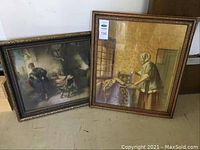 Two framed prints leaning against a wall, showing full view of artwork and frames.