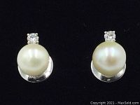 Front view of both earrings showing pearls and diamonds