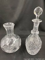 Photo showing the vase and decanter side by side, illustrating size and general shape