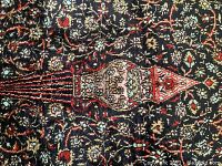 Close-up of central medallion and vine pattern