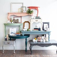 Photo showing various tables and furniture pieces painted in multiple colors using Mango Reclaimed paint, highlighting the finish and color options.