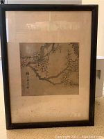 Full view of framed watercolor artwork showing black painted wooden frame, beige patterned mat, blossoming branch painting with calligraphy and red seal