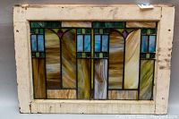 Front view showing full stained glass design and painted frame