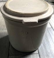 Top and side view showing overall shaped crock with lid and embossed number 2.