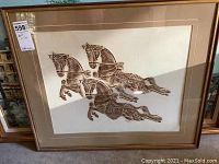 Framed horse art print with three horses in a stylized brown pattern, visible full piece.