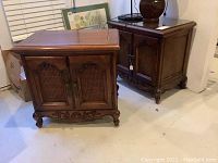 Two matching wood nightstands with cane inset doors, one with glass top and one without, shown together on floor