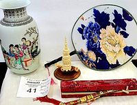 Overview of all four items: Chinese vase, cloisonné dagger with red box, wooden pagoda pen holder, and floral handheld fan