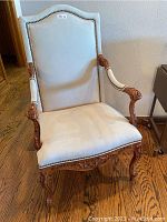 Front view of chair showing full upholstery and frame