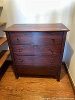 Front view of mission style 4 drawer cherry stained bureau