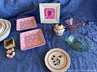 Overview of all items including Pfaltzgraff white serving bowls, Mikasa Venus fine china bowls, pink polka dot dishes, porcelain napkin rings, iridescent sugar bowl and Depression era glass pieces