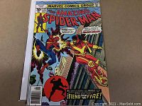 Front cover of The Amazing Spider-Man #172 comic showing Spider-Man fighting Rocket Racer on a city rooftop, published by Marvel Comics Group, marked 30 cents, September 1977 issue.