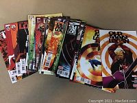 38 issues of Old Man Logan comics laid out showing a variety of cover art styles including target artwork and character scenes.