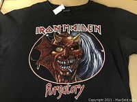 Front view of the black Iron Maiden Purgatory vintage T-shirt showing graphic design and text.