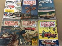 Overview of all six vintage magazines showing title and cover imagery including cars, boats, and mechanical themes